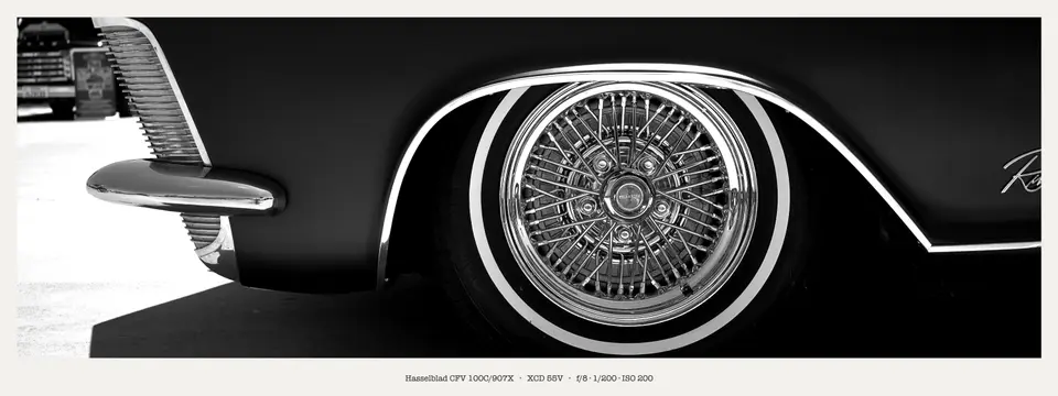 Wire spokes and a fat whitewall