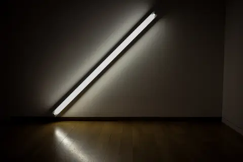 A single tube drawn across the wall